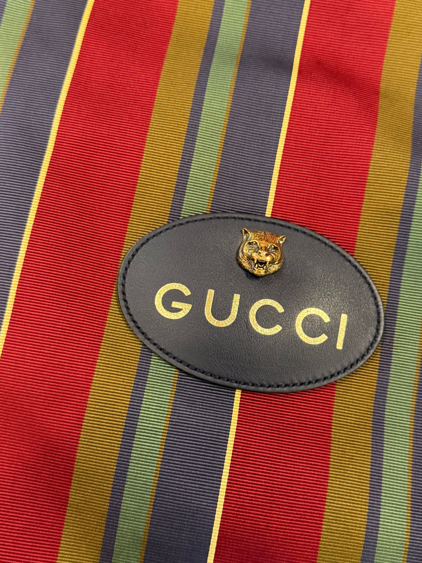 Gucci stripe drawstring backpack