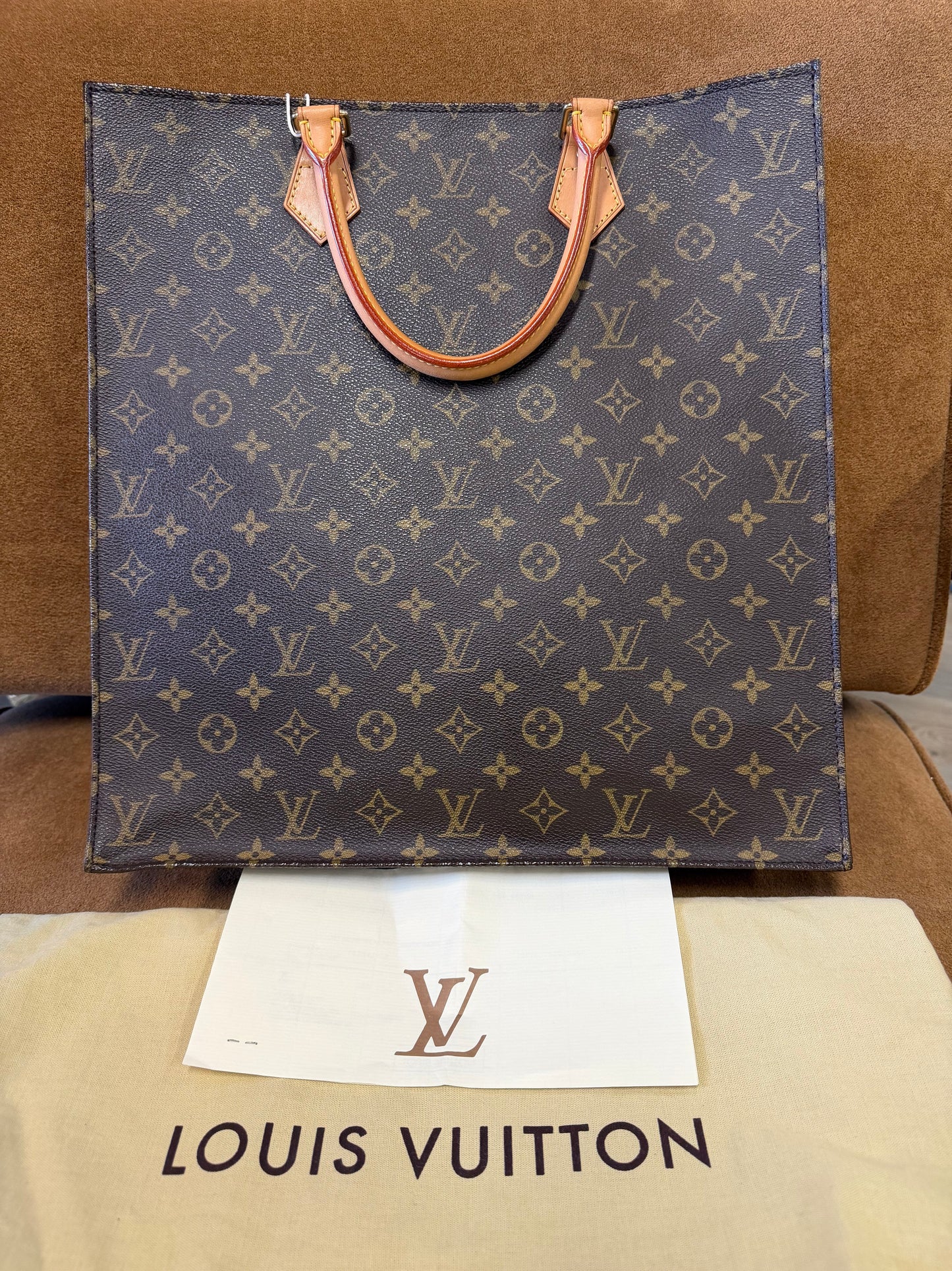 Louis Vuitton Monogram coated canvas with vachetta leather trim
