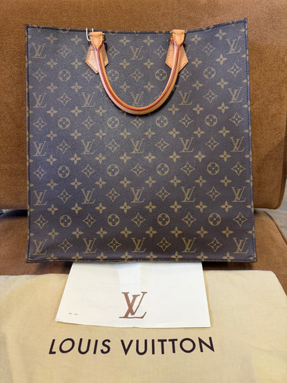 Louis Vuitton Monogram coated canvas with vachetta leather trim