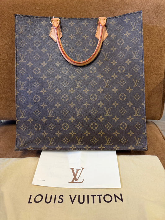 Louis Vuitton Monogram coated canvas with vachetta leather trim