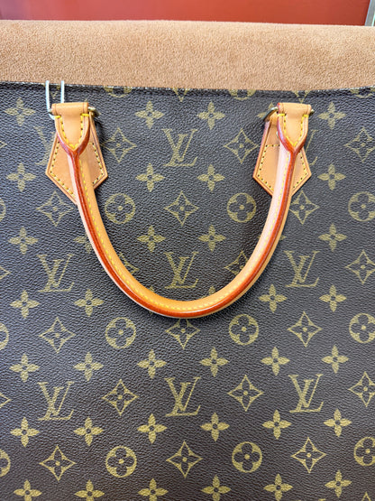 Louis Vuitton Monogram coated canvas with vachetta leather trim
