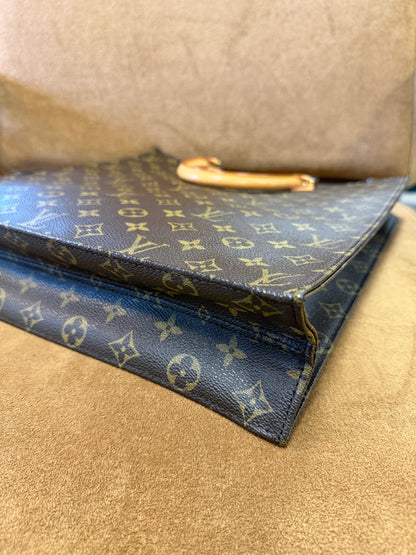 Louis Vuitton Monogram coated canvas with vachetta leather trim